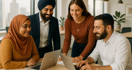 People with laptops in a room